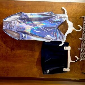 Brand new Disney leotard and shorts size 8/10 and could fit a small 12.